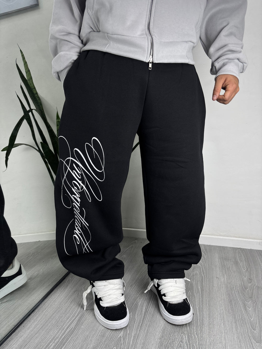 Jogging Letter Negro